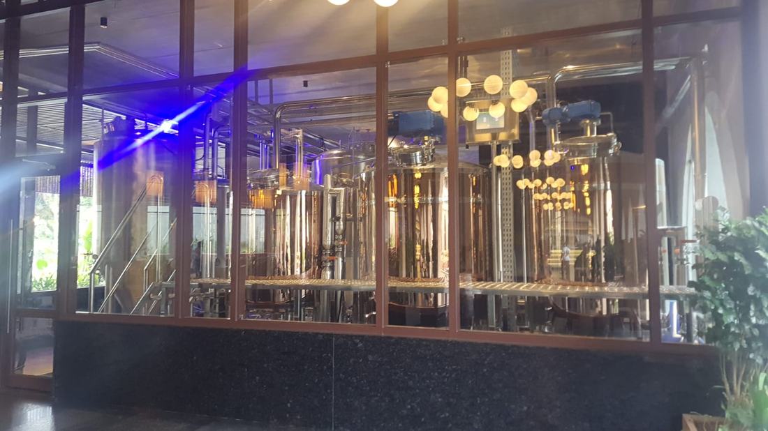 Brewing tanks inside the on-site brewhouse at Legacy Brewing Company, RR Nagar